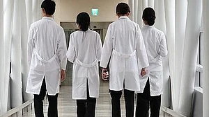 Representative image of medical professionals walking through a hospital lobby (photo: IANS)