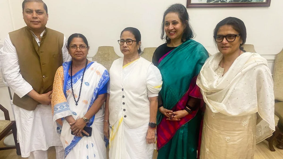 Mamata Banerjee (centre) with the TMC Rajya Sabha nominees (photo: @AITCOfficial/X) 