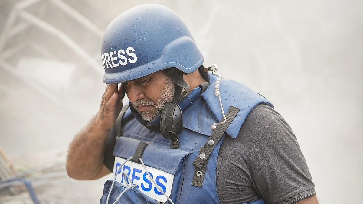 Wael al Dahdouh, Al Jazeera bureau chief, stands amidst dust and rubble in Gaza, an image captured by his now deceased eldest son, journalist Hamza Dahdouh (photo: @hamzadah1996/X)
