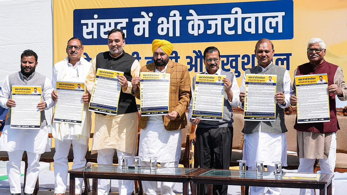 AAP convener Arvind Kejriwal and Punjab CM Bhagwant Mann during a press conference in New Delhi on 8 March (photo: PTI)