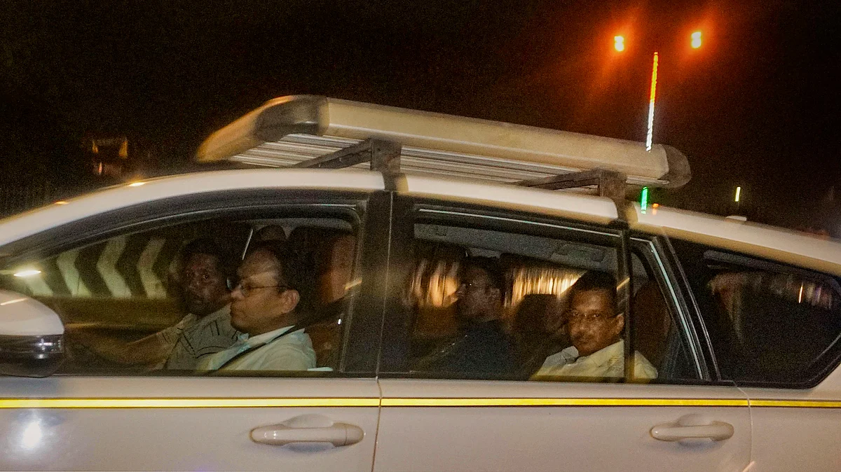 Delhi CM Arvind Kejriwal being taken away from his residence after he was arrested by the ED in an excise policy-linked money laundering case, in New Delhi, 21 March 21 (photo: PTI)