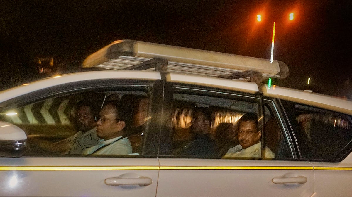 Delhi CM Arvind Kejriwal being taken away from his residence after he was arrested by the ED in an excise policy-linked money laundering case, in New Delhi, 21 March 21 (photo: PTI)