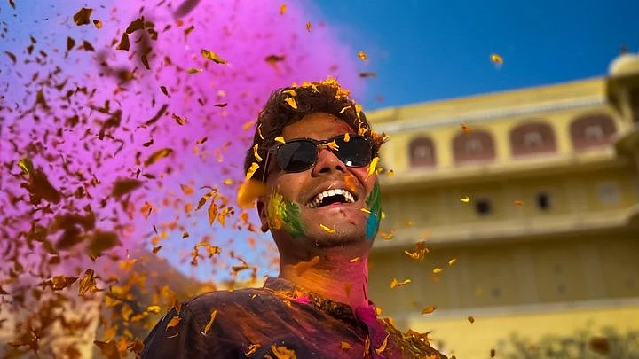 Apple CEO shared a photo shot by photographer Joshua Karthik to extend Holi wishes (@tim_cook/X)