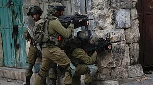 Israel detains 22 Palestinians in West Bank, including prisoners released in 'swap deal'