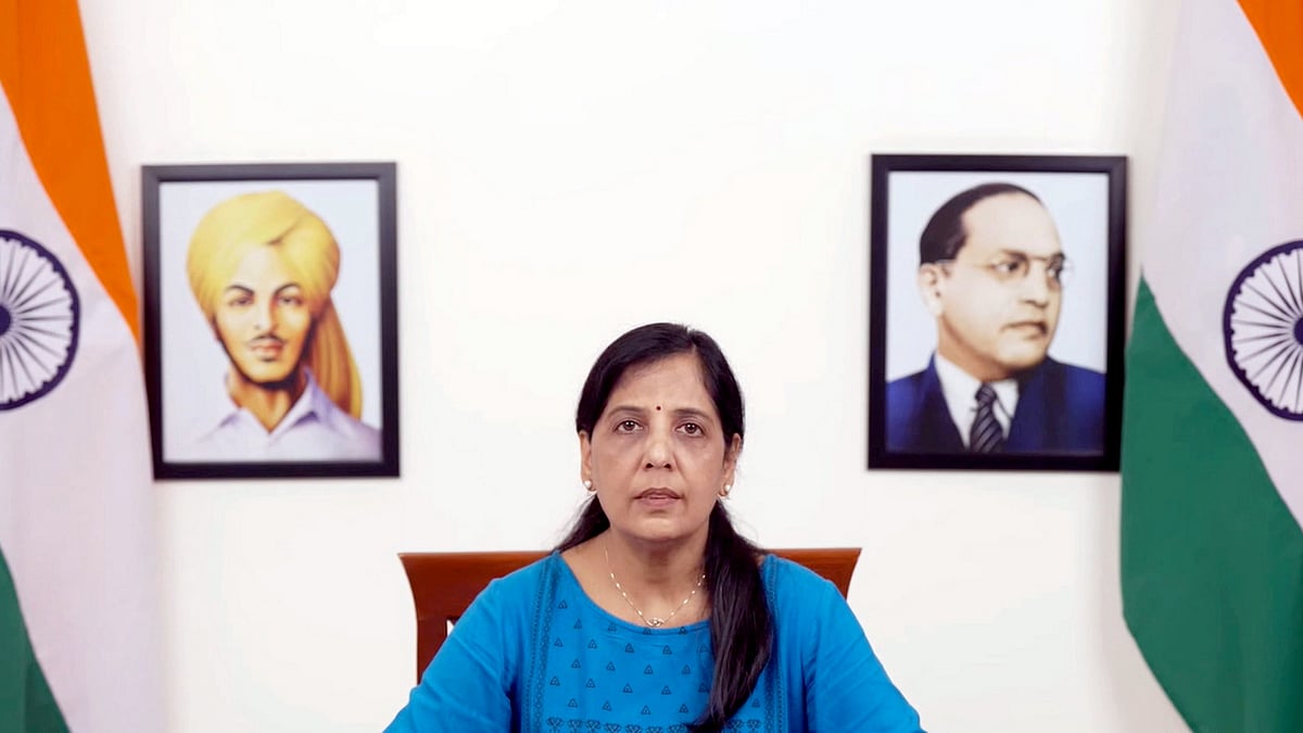 Sunita Kejriwal virtually addresses a press conference in New Delhi on 28 March (photo: PTI)