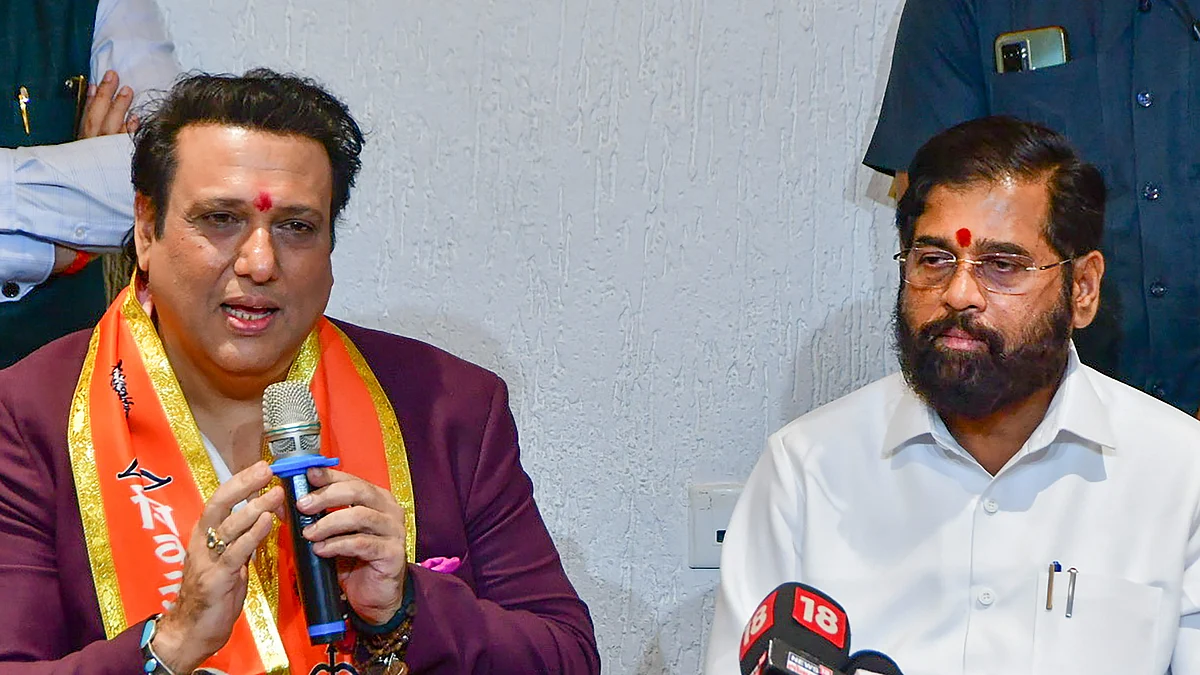 Maharashtra CM Eknath Shinde and actor Govinda at press conference in Mumbai on 28 March (photo: PTI)