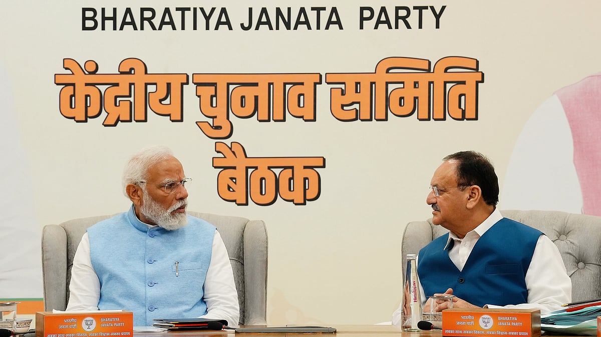 File photo of PM Narendra Modi and BJP president J.P. Nadda at a party  meeting (photo: PTI)