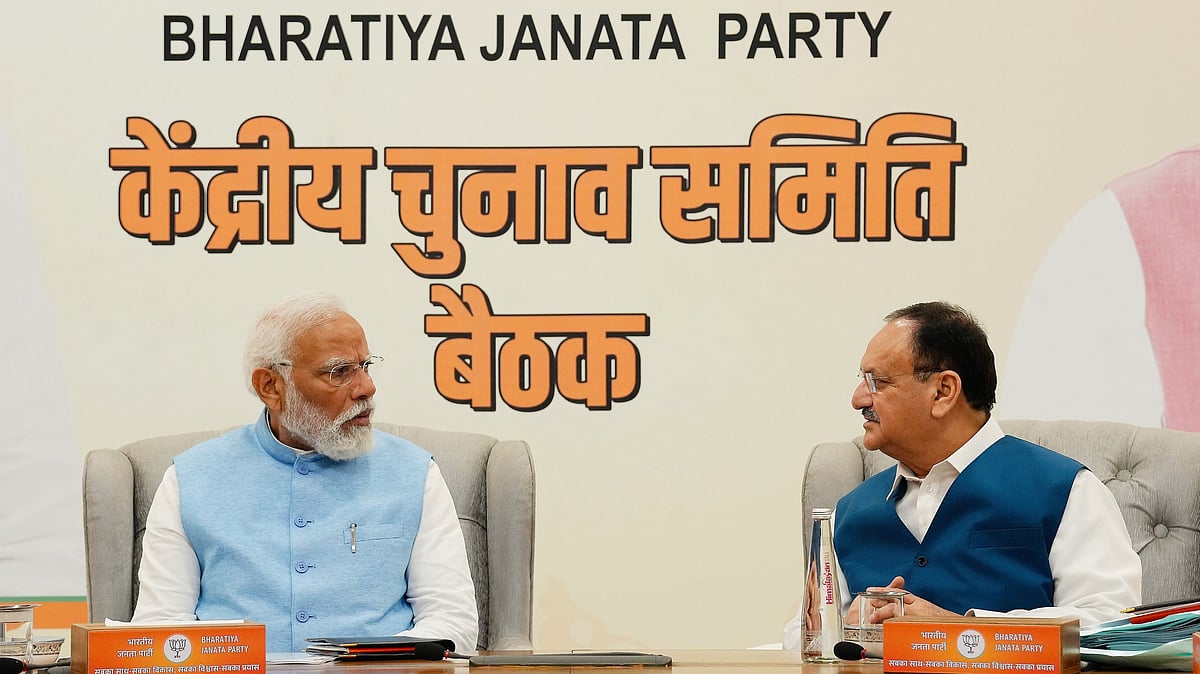 File photo of PM Narendra Modi and BJP president J.P. Nadda at a party  meeting (photo: PTI)