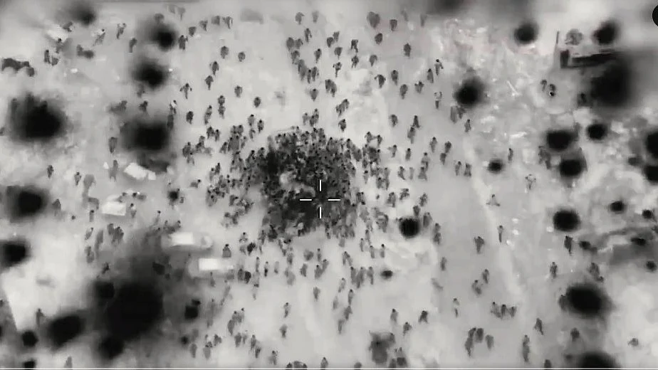 Drone footage released by Israel Defence Forces, reportedly showing Palestinians rushing to a food truck