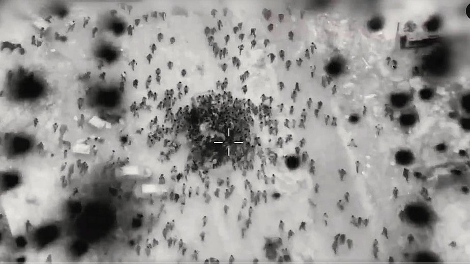 Drone footage released by Israel Defence Forces, reportedly showing Palestinians rushing to a food truck