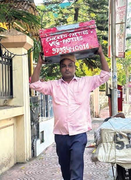The
patticewala with his tin trunk full of goodies