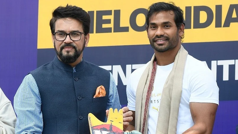 Kishore Jena (right) with Anurag Thakur, Union Minister of Sports & Youth Affairs, at the launch of Khelo India talent research programme on 12 March. (photo: SAI)