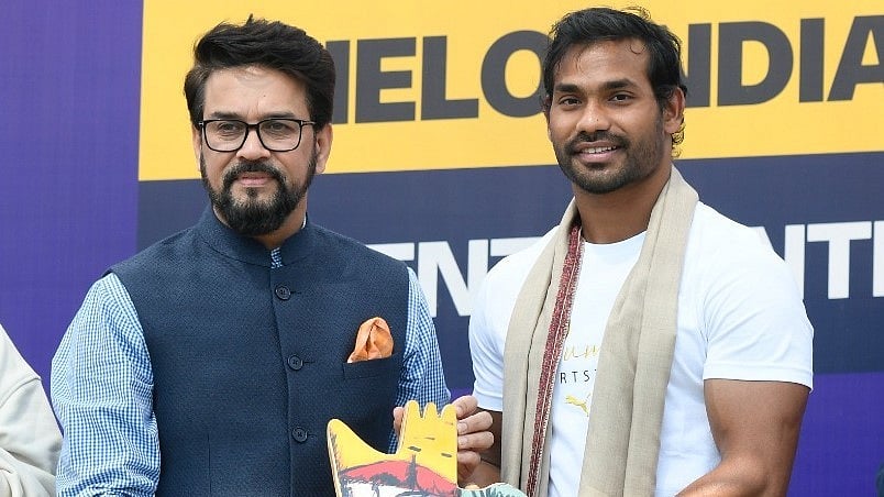 Kishore Jena (right) with Anurag Thakur, Union Minister of Sports & Youth Affairs, at the launch of Khelo India talent research programme on 12 March. (photo: SAI)