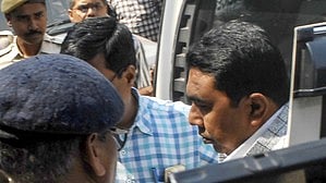 Sheikh Shahjahan being produced at West Bengal police headquarters in Kolkata on 2 February (photo: IANS)
