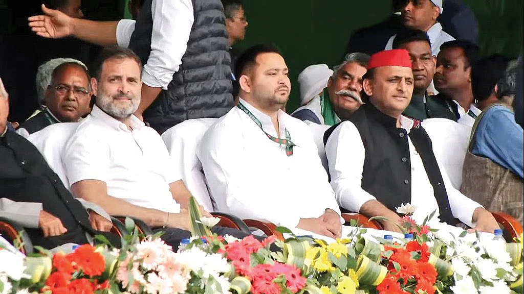 Rahul Gandhi, Tejashwi Yadav and Akhilesh Yadav (right to left) at the Jan Vishwas Rally in Patna (photos: Getty Images)