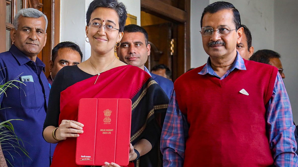 Finance minister Atishi Singh with CM Arvind Kejriwal at Vidhan Sabha in Delhi on Monday (photo: PTI)