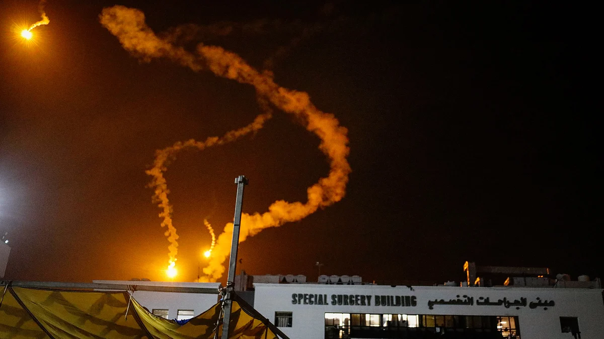 File photo of rockets in the night sky above Al-Shifa hospital in Gaza City, November 2023