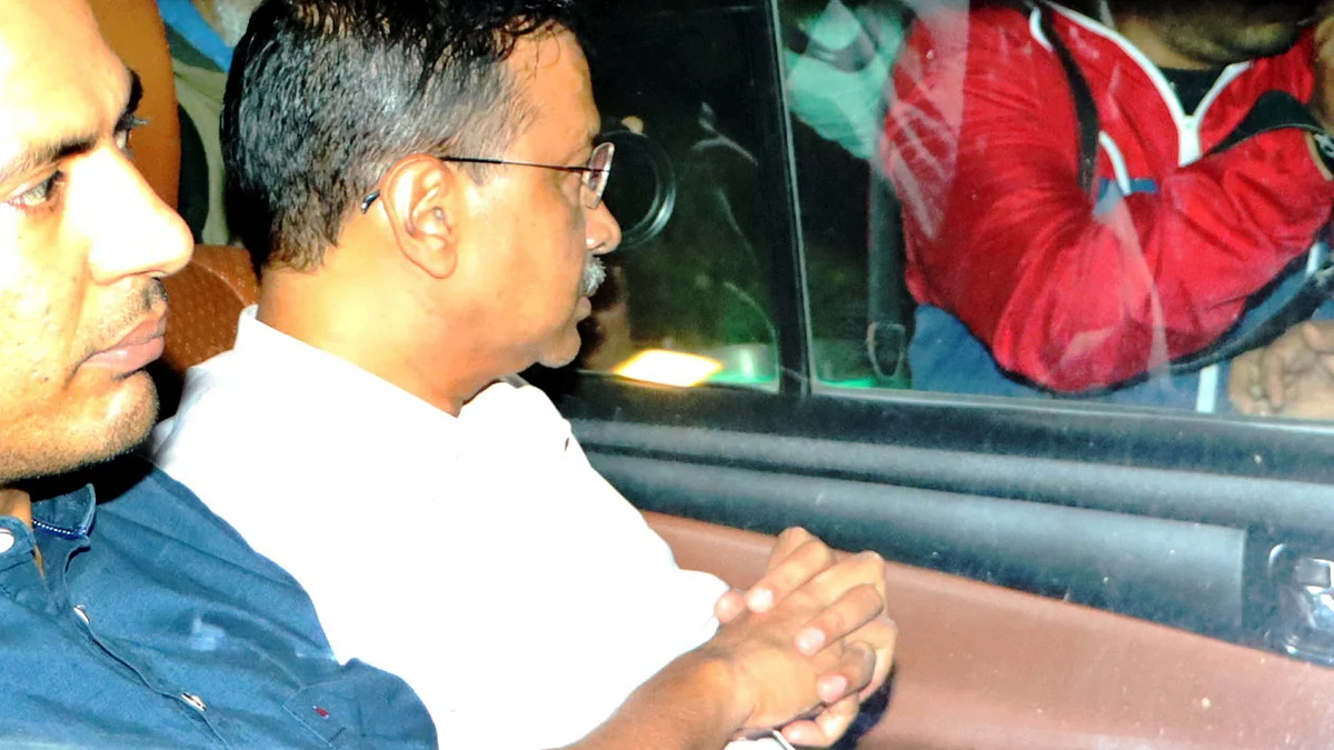 Delhi chief minister Arvind Kejriwal being taken to the Enforcement Directorate office, New Delhi, 21 March 2024 (photo: PTI)
