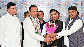 RLP leader Ummedaram Beniwal joining Congress at the party headquarters in Jaipur on 16 March (photo: IANS)