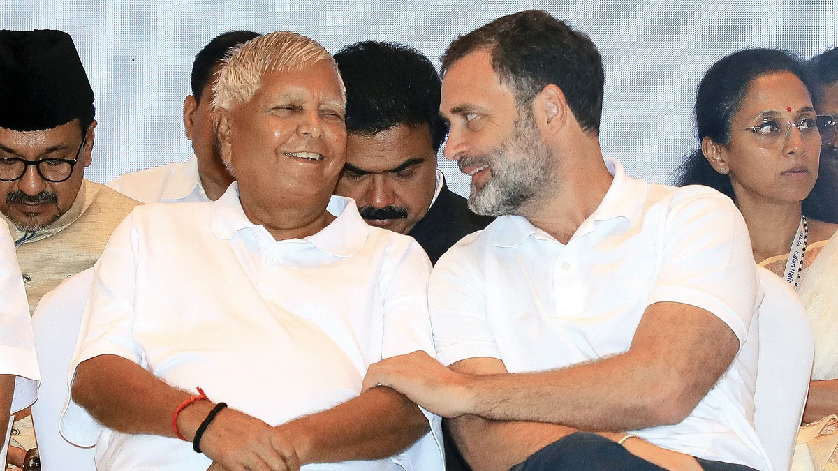 "Rahul Gandhi [right] is reaching out to the people, sharing their agony and distress. He is doing what a responsible opposition leader should," says Lalu Prasad Yadav (left) (photo: Nur Photo for Getty Images)