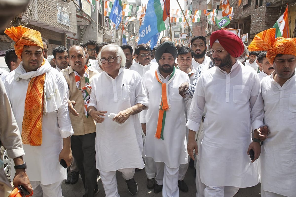 Jairam Ramesh participates in a rally with Congress leaders