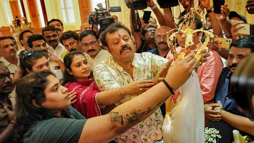 BJP's Suresh Gopi, contesting from Thrissur, tried to woo the Christian community with a crown for the Virgin Mary—which promptly fell off and broke apart (photo courtesy @RishiJoeSanu/X)