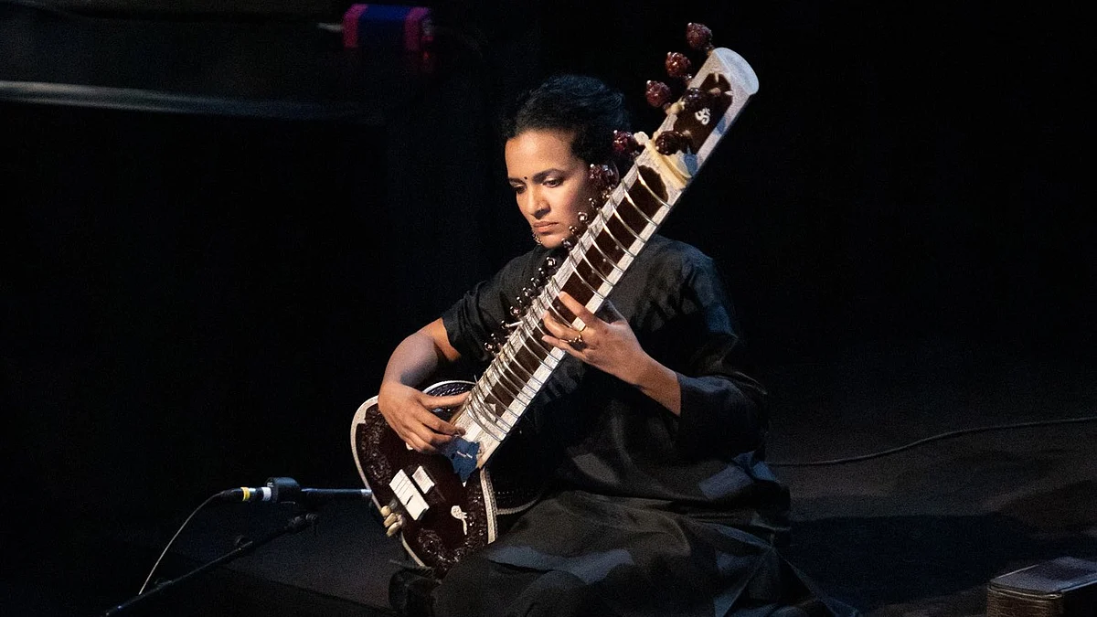 Representative image of an artist playing the sitar (@ShankarAnoushka/X)