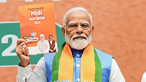 PM Narendra Modi releases the BJP manifesto (photo: PTI)