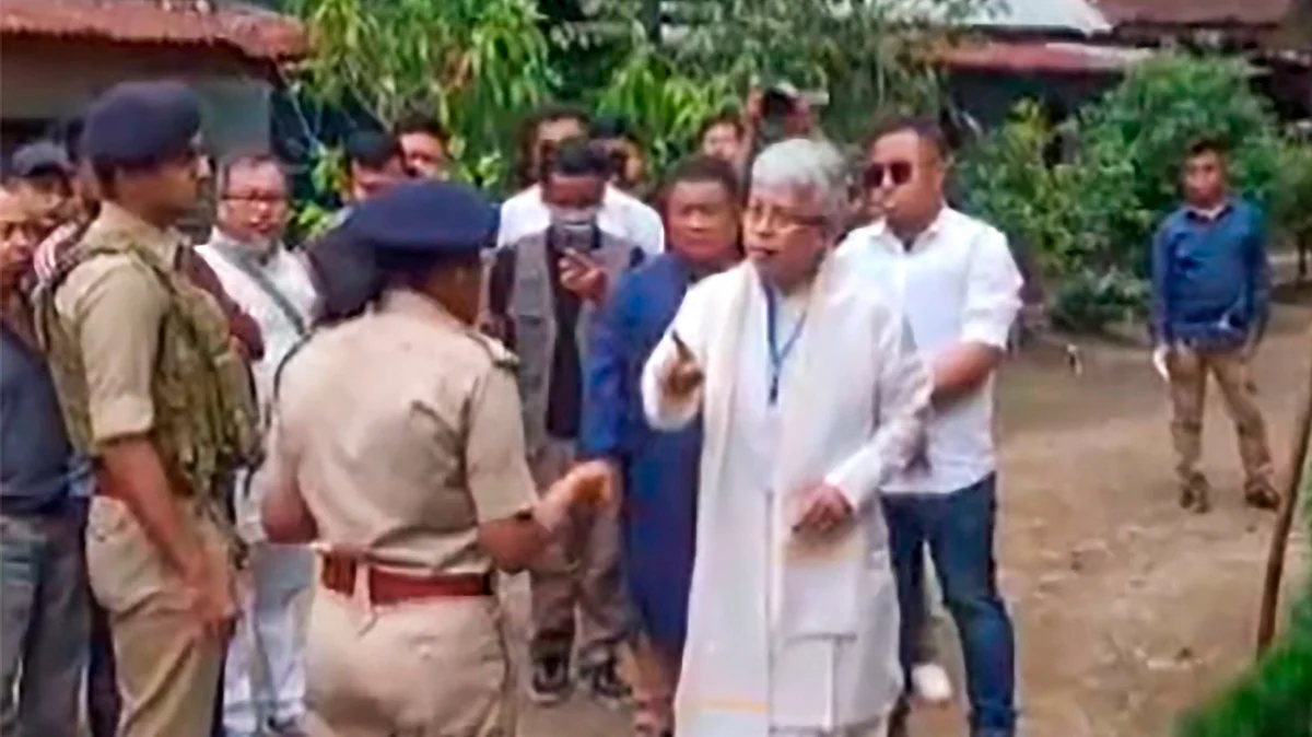 Screen grab from PTI video showing Bimol Akoijam of the Congress arguing with security personnel