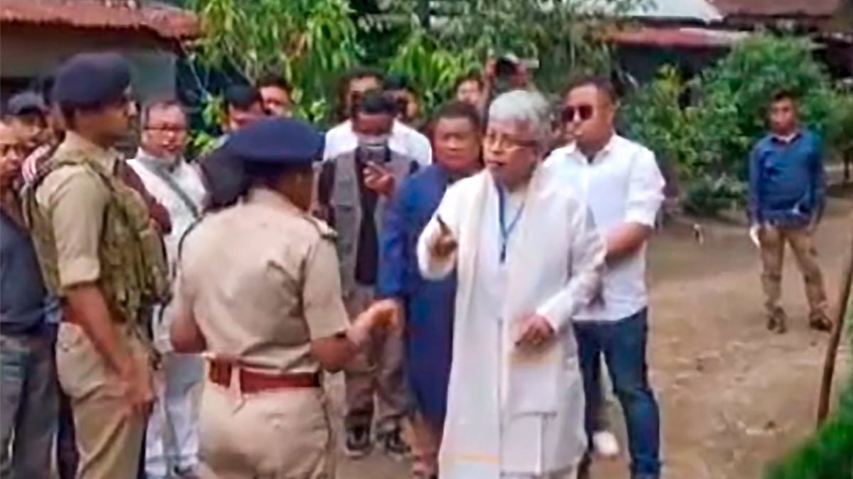 Screen grab from PTI video showing Bimol Akoijam of the Congress arguing with security personnel