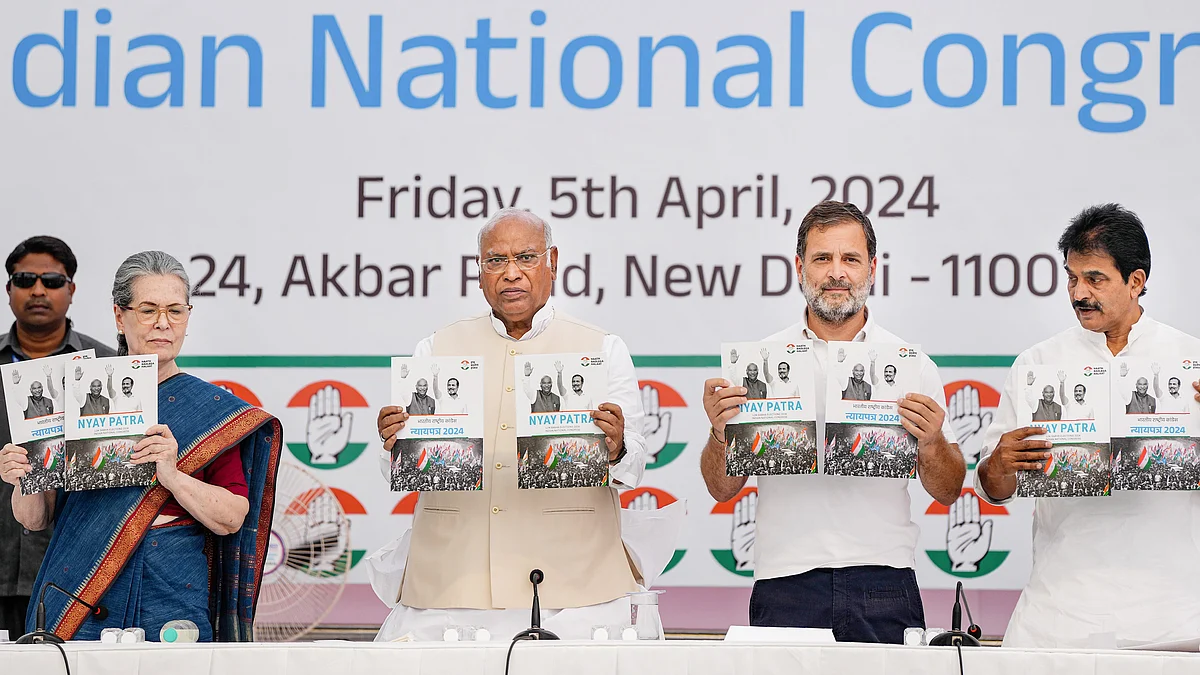 (From left) Sonia Gandhi, Mallikarjun Kharge, Rahul Gandhi and K.C. Venugopal release the manifesto in Delhi (photo: PTI)