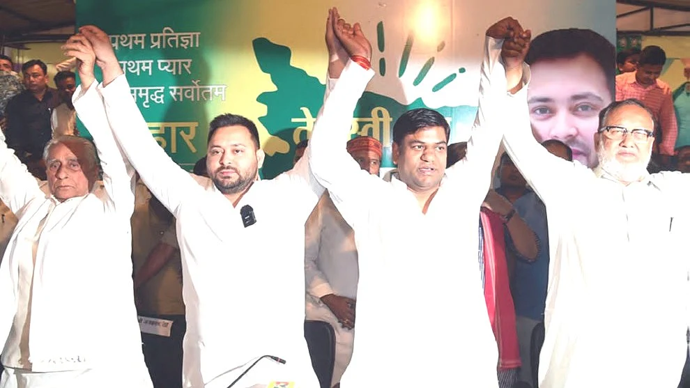 RJD leader Tejashwi Yadav with Vikassheel Insaan Party (VIP) president Mukesh Sahani and others in Patna.