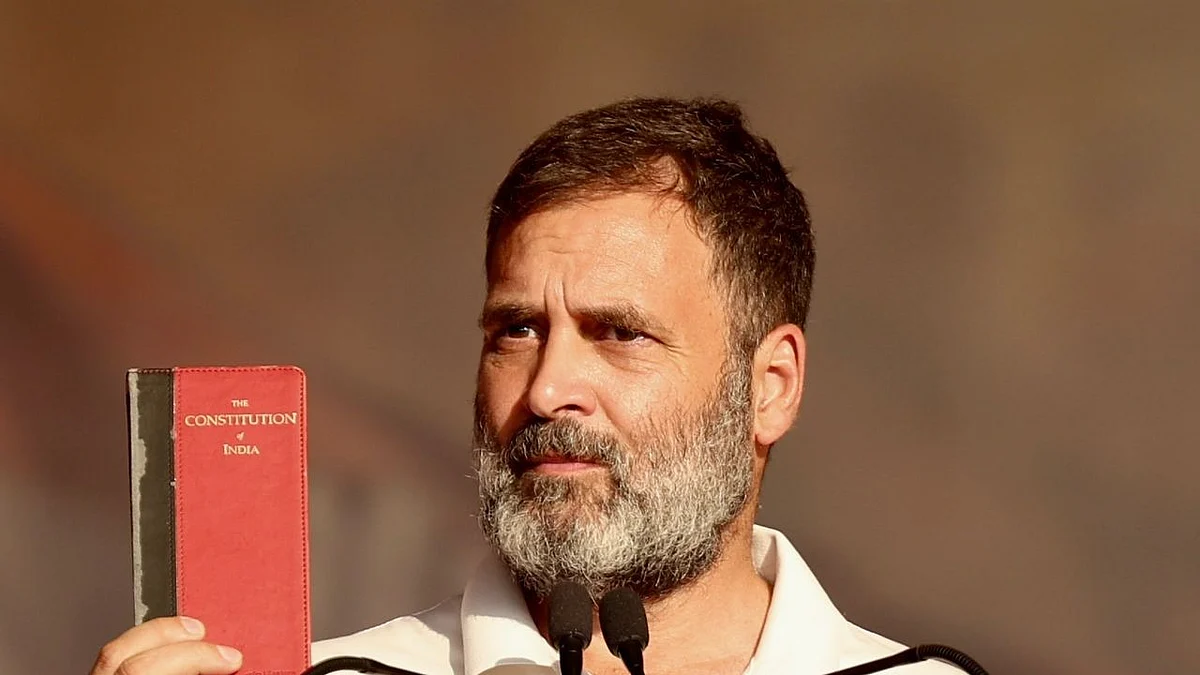 Congress leader Rahul Gandhi displays a copy of the Indian Constitution at a public meeting in Chhattisgarh's Bilaspur on Monday, 29 April 2024