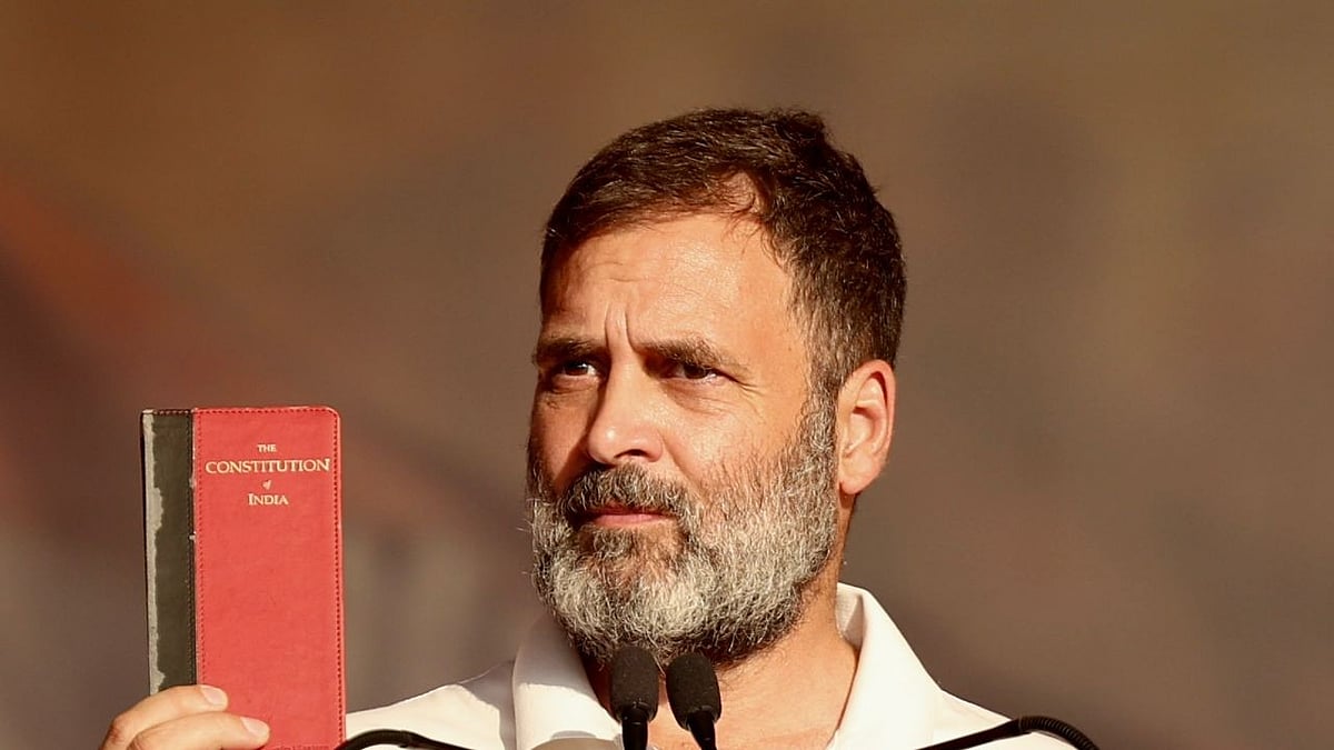 Congress leader Rahul Gandhi displays a copy of the Indian Constitution at a public meeting in Chhattisgarh's Bilaspur on Monday, 29 April 2024