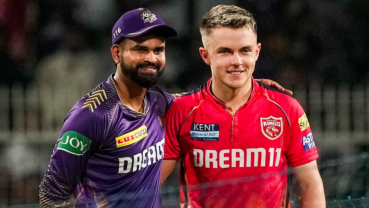 Shreyas Iyer and Sam Curran pose for a photo during an IPL match between Kolkata Knight Riders and Punjab Kings at Eden Gardens on 26 April