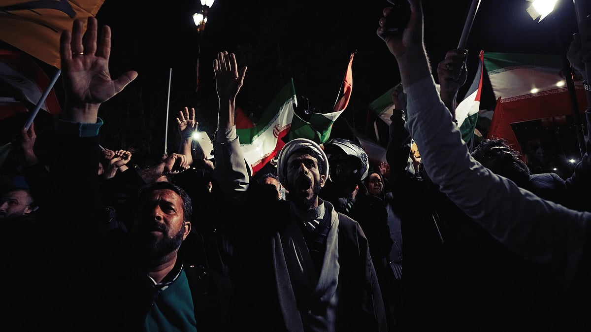 Iranian demonstrators at an anti-Israel gathering in front of the British Embassy in Tehran, early Sunday (photo: AP/PTI) 