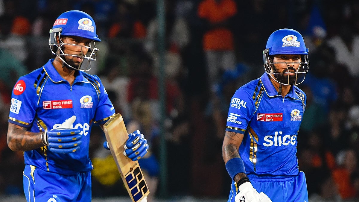 Hardik Pandya (right) walks out to bat with Tilak Varma (photo: PTI)