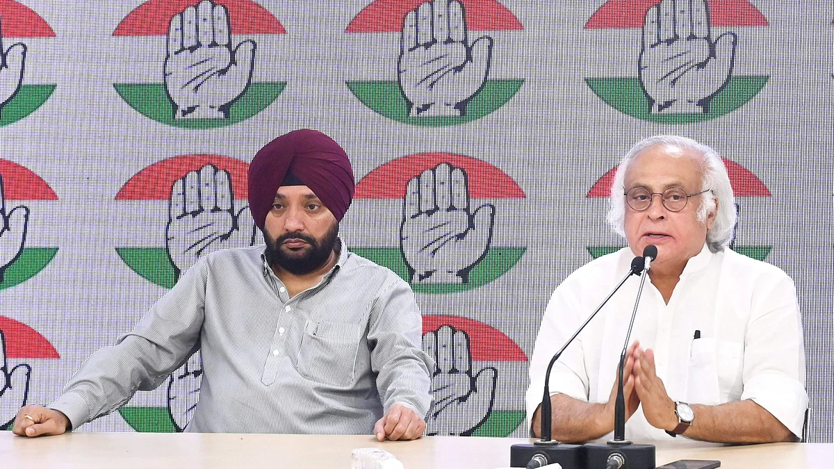 Congress leaders Jairam Ramesh and Arvinder Singh Lovely during a press conference in New Delhi on 30 March (photo: PTI)