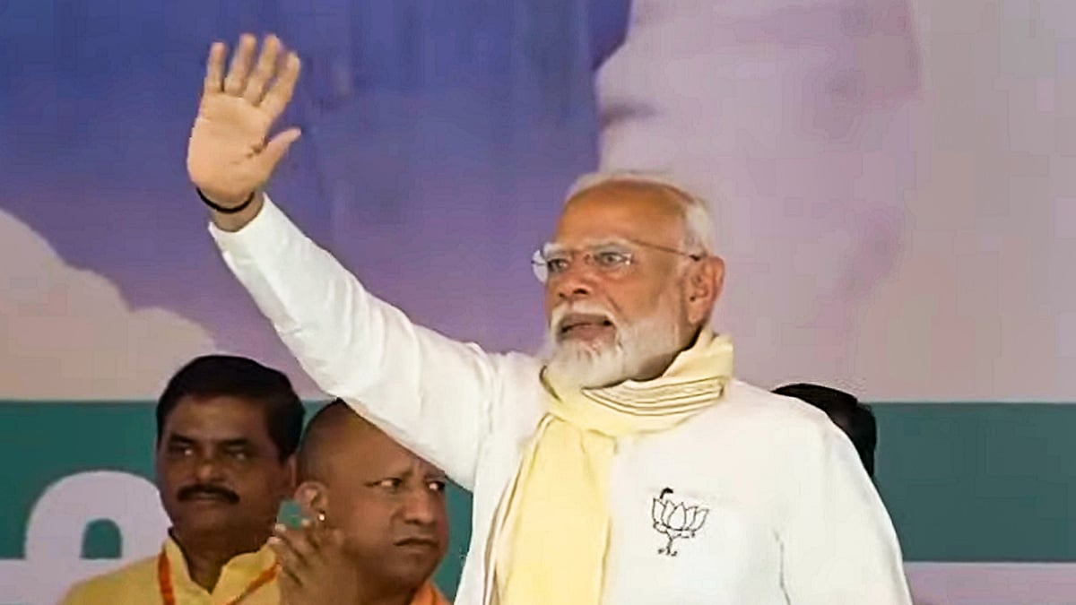 PM Modi and CM Yogi Adityanath at a rally in Uttar Pradesh (photo: PTI)
