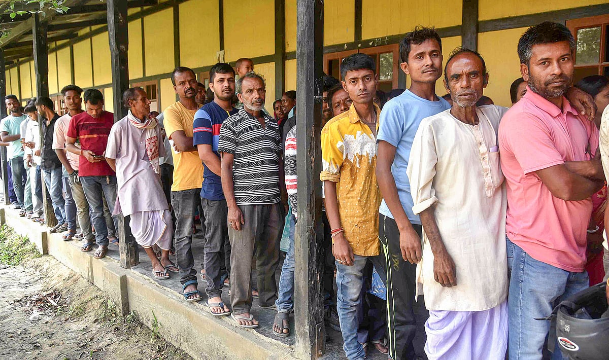 Voters at Mayong in Morigaon district of Assam (photo: PTI)