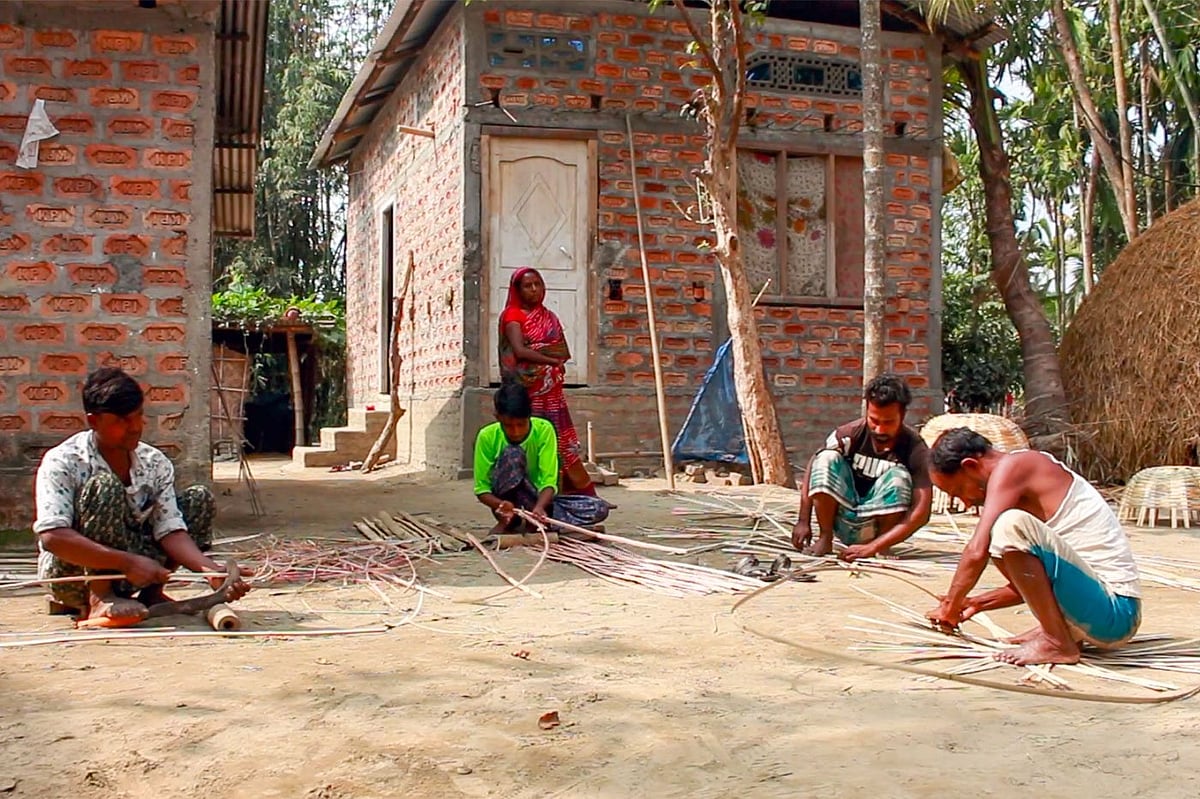 The men of the Miya community make strips of the bamboo and sort for strength and flexibility