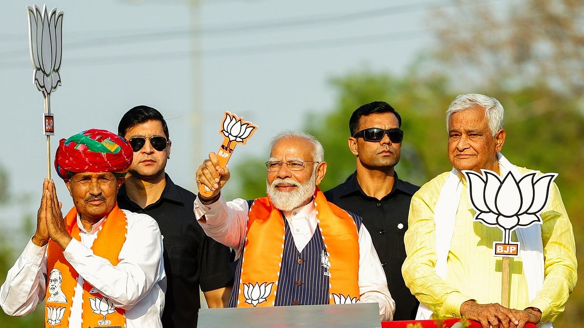 PM Modi at a roadshow in Rajasthan (photo: @BJP4India/X)