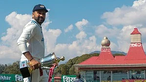 Rohit Sharma with the trophy after India won the fifth test match against England in Dharamshala on 9 March (photo: IANS)