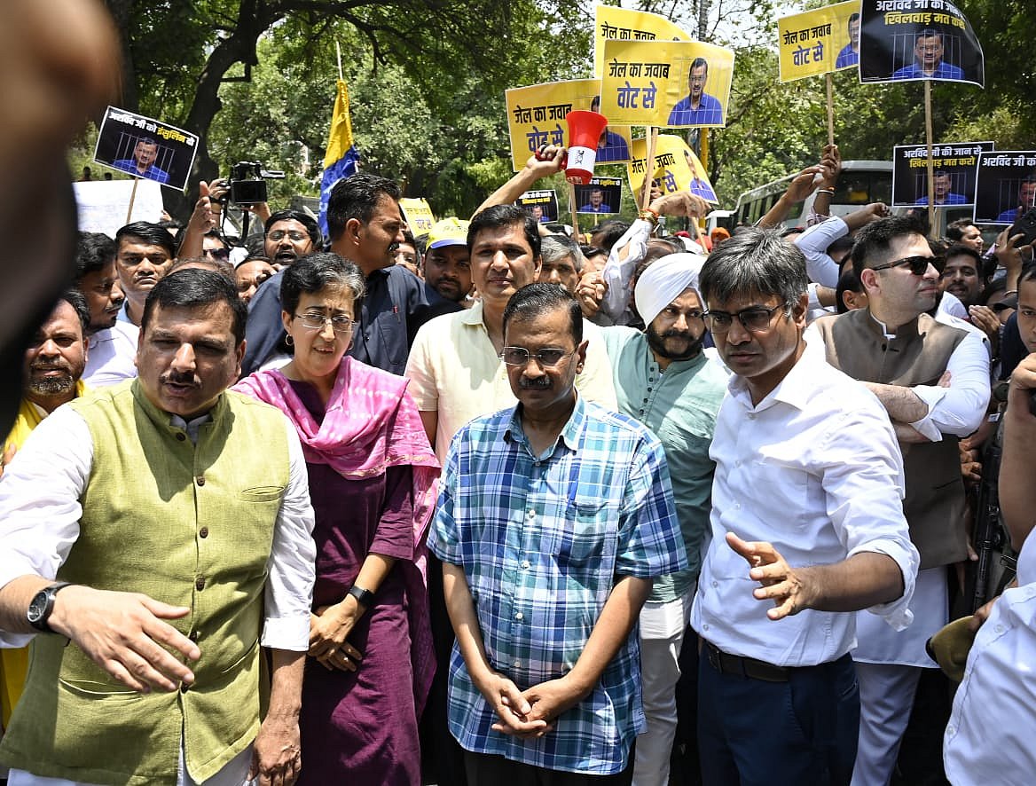 Arvind Kejriwal, Sanjay Singh, Atishi Marlena and Raghav Chadha at the protest rally