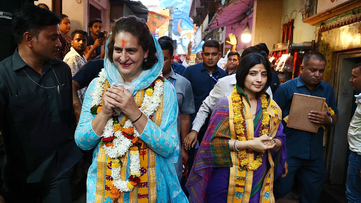 Priyanka Gandhi Vadra (left) and Dimple Yadav at their joint roadshow in Varanasi