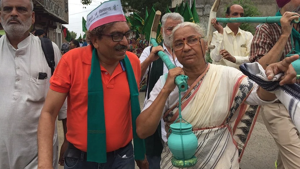 Medha Patkar at a demonstration (photo courtesy @medhanarmada/X)