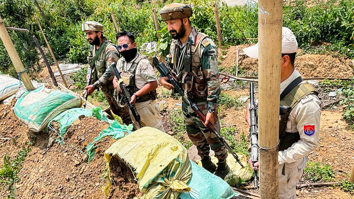 Manipur Police and Army personnel during a search and area domination operation in Manipur (photo: PTI)
