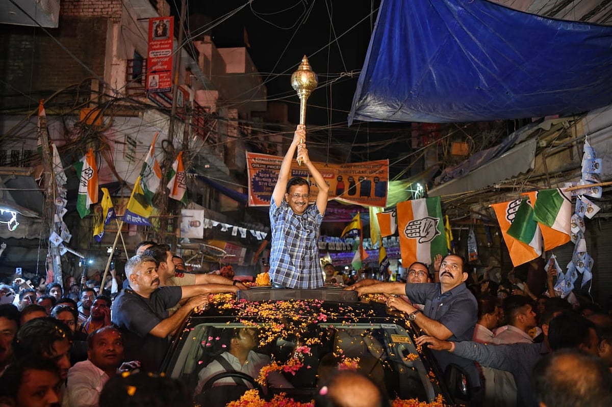 Arvind Kejriwal brandishes a gada a la Hanuman, thanks the god for his bail (photo: Vipin/National Herald)