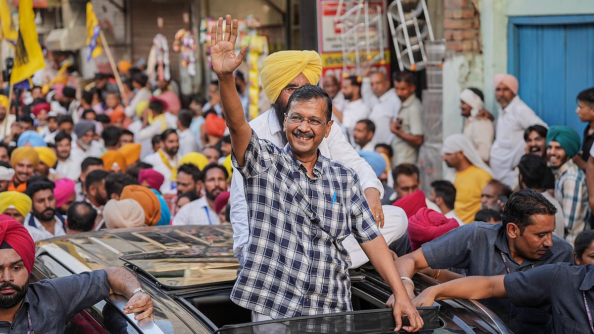 Arvind Kejriwal during a roadshow in Bathinda on 26 May (photo: PTI)