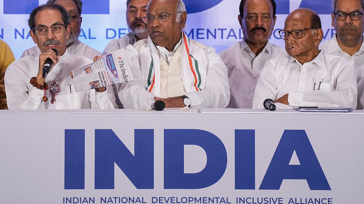 Mallikarjun Kharge, Sharad Pawar and Uddhav Thackeray during a press conference in Mumbai on 18 May (photo: PTI)